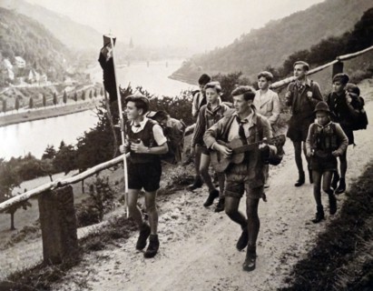 Boy scouts marching to camp