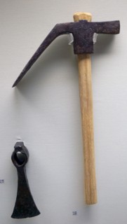 Dolabra with a reconstructed wooden handle