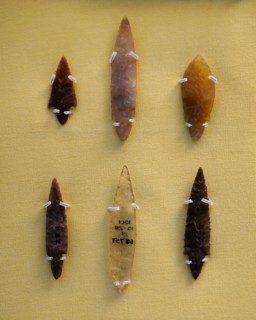 Collection of flint and rock crystal arrowheads and a flint knife