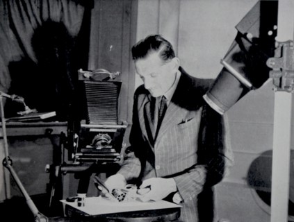 Police officer photographing identity marks