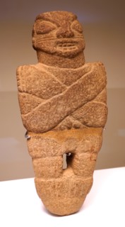 Peg-base stone figure