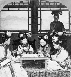 Manchurian ladies at tea and cards, Peking, China 1902.