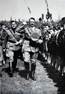 Adolf Hitler, salutes Hitler Youth Rally