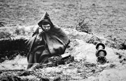 WWII: French army radio operator telephones instructions at a front line position 1940