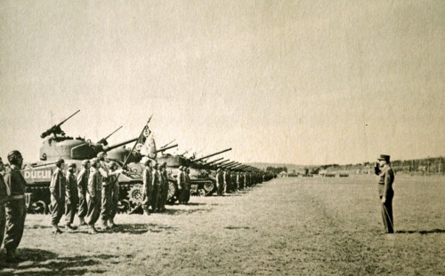 Free French General de Lattre reviews tanks
