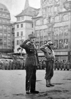 General Leclerc salutes at a parade in central strasburg