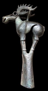 Bronze pole-top in the form of an elk. Ordos type, 6th-5th century BC.