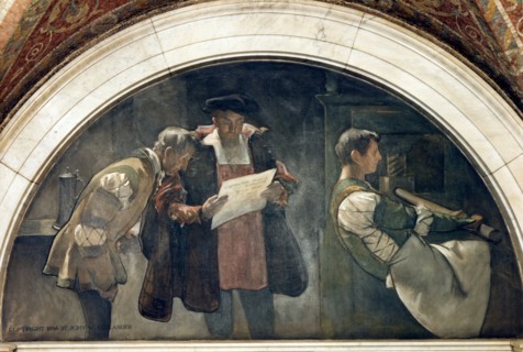Man working at a printing press