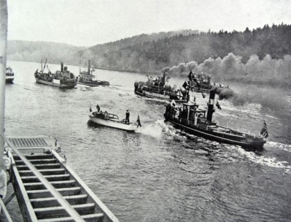 Norwegian boats escort the ship carrying the royal family into Oslo