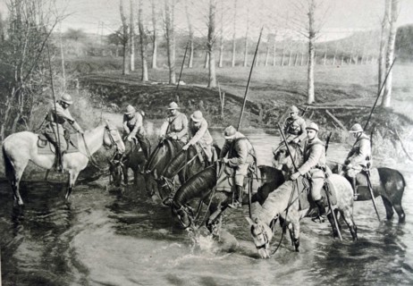 French cavalry horses drink at a river
