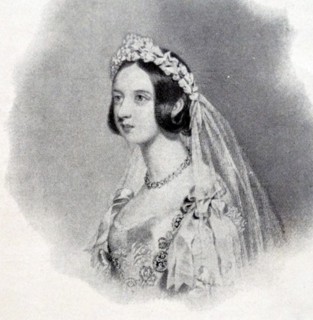 Queen Victoria of the United Kingdom in her bridal dress and veil