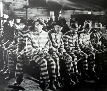 "I am a Fugitive from a Chain Gang", 1932.  A jobless veteran, Paul Muni (top) tries to pawn the Congressional Medal of Honor he won in the A.E.F, but they're a drug on the market.  He is famous for a...