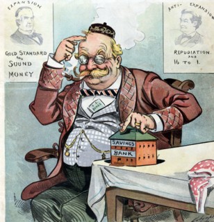 An elderly German American man pointing to a coin bank