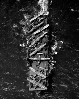 Planes aboard the deck of the USS Thetis Bay