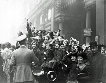 London; England. crowds celebrate the Armistice at the end of WWI 1918