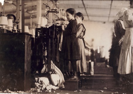 Photograph of a young girl employed as a knitter