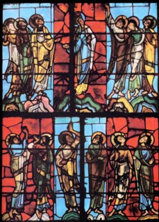 Stained glass window from le mans Cathedral, France. Shows The Virgin Mary with the Apostles