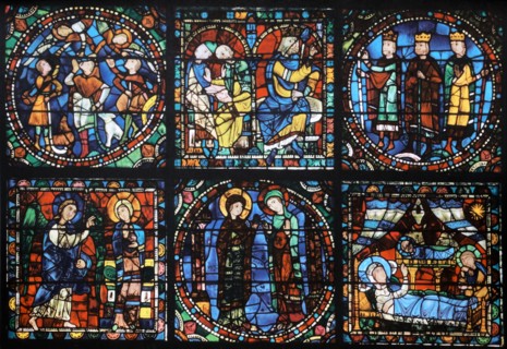 Stained glass window from above the main entrance to Chartres Cathedral, France. Shows the life of Christ: