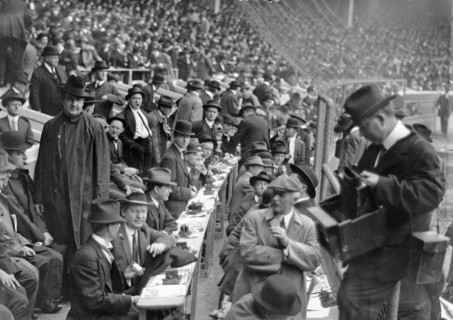 Reporters sending their reports via telegraph from a baseball game, at the Polo Grounds, in New York City,
