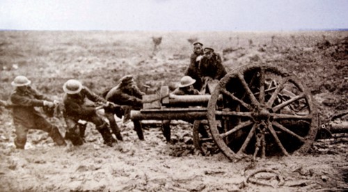 World war one British artillery gun is hauled through mud into a firing position 1915