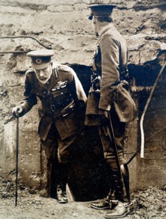 Photograph of an elderly soldier revisiting the Belgian front