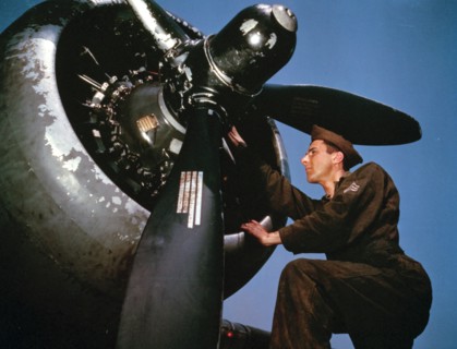 Colour photograph of the servicing of an A-20 bomber