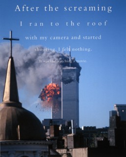 Colour photograph showing the burning World Trade Centre
