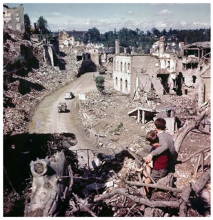 Photograph of French boys observing Allied vehicles 1944