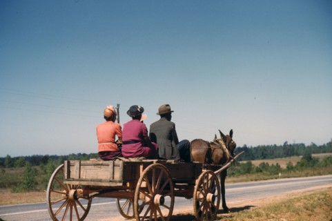 African American family travelling to town on a Saturday afternoon