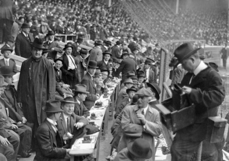 American sports journalists at a baseball match