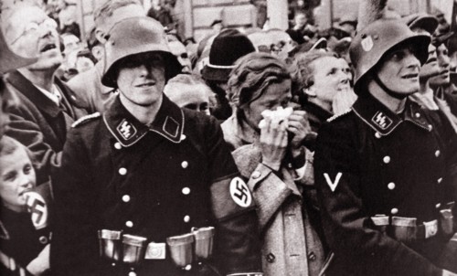 Austrian crowds show emotion and anticipation as German forces enter Vienna during the Anschluss