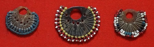 Tortoise-shell earrings from Papua New Guinea, with glass beads traded from Europe, Circa 1900