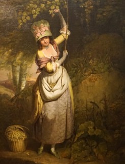 Painting titled 'Girl Gathering Filberts' by William Redmore Bigg