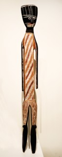 Mouky human shaped figure carved from wood