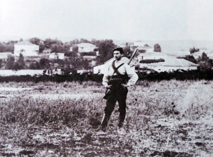 Jewish 'Shomer' settler guard in afield protecting the village of Rehovot
