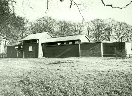 Photograph of a building housing a horizontal solar tower as part of the Cambridge University observatories