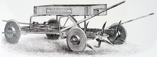 A moveable anchor vehicle for use at one end of a field to act as a pulley block for rope to which a plough is attached in steam ploughing