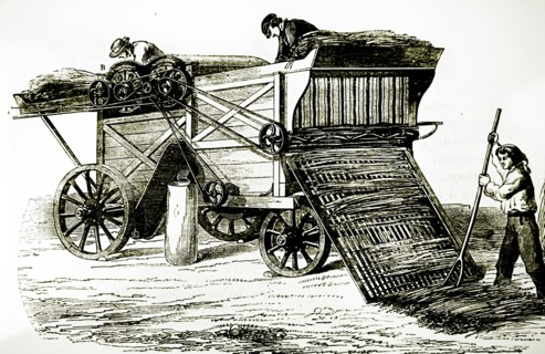 Engraving depicting a steam-driven threshing machine
