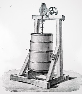 A Holstein vertical butter churn