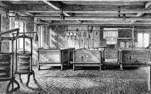 The interior of the Brailsford Cheese Factory near Derby, showing milk vats and cheese presses