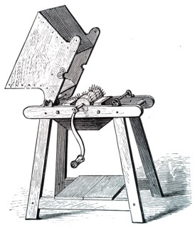 A curd mill for grinding the curd before placing it with salt in a cheese vat, used in the manufacturing Cheshire cheese