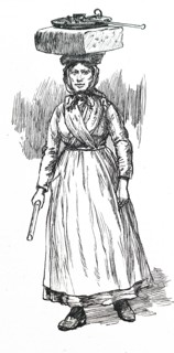 An Italian woman from San Remo selling cheese