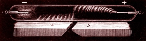 A Geissler tube, an early gas discharge tube used to demonstrate the principles of electrical glow discharge, similar to modern neon lighting