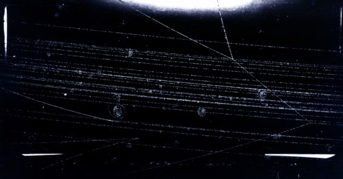 Photograph of a Bev Proton from the Cosmotron colliding with a proton in the liquid hydrogen bubble chamber