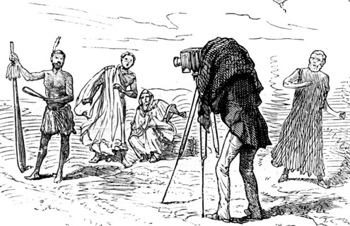 A photographer taking photographs of Maori natives in New Zealand