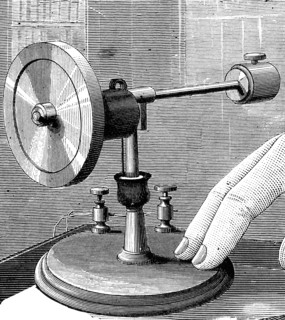 An electric gyroscope, a device consisting of a wheel or disc mounted so that it can spin rapidly about an axis which is itself free to alter in direction