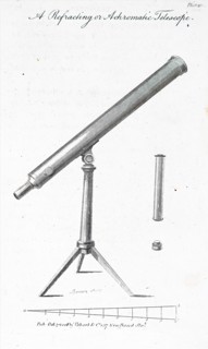 A small reflecting telescope mounted on a tripod
