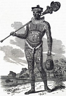 A Marquesas Islander with a heavily tattooed body