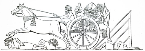 Assyrian warriors in a cart captured from the enemy