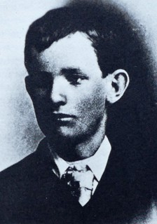 Police profile and photograph of John McCoy an American criminal